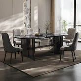 Oval dining table with black marble top and trestle metal base, modern dining room set
